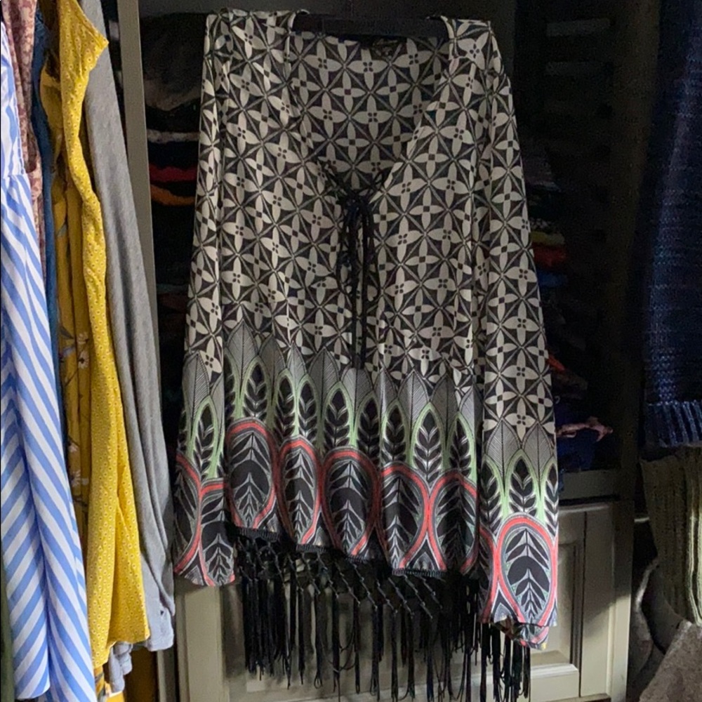 Dress blouse with tassels at bottom